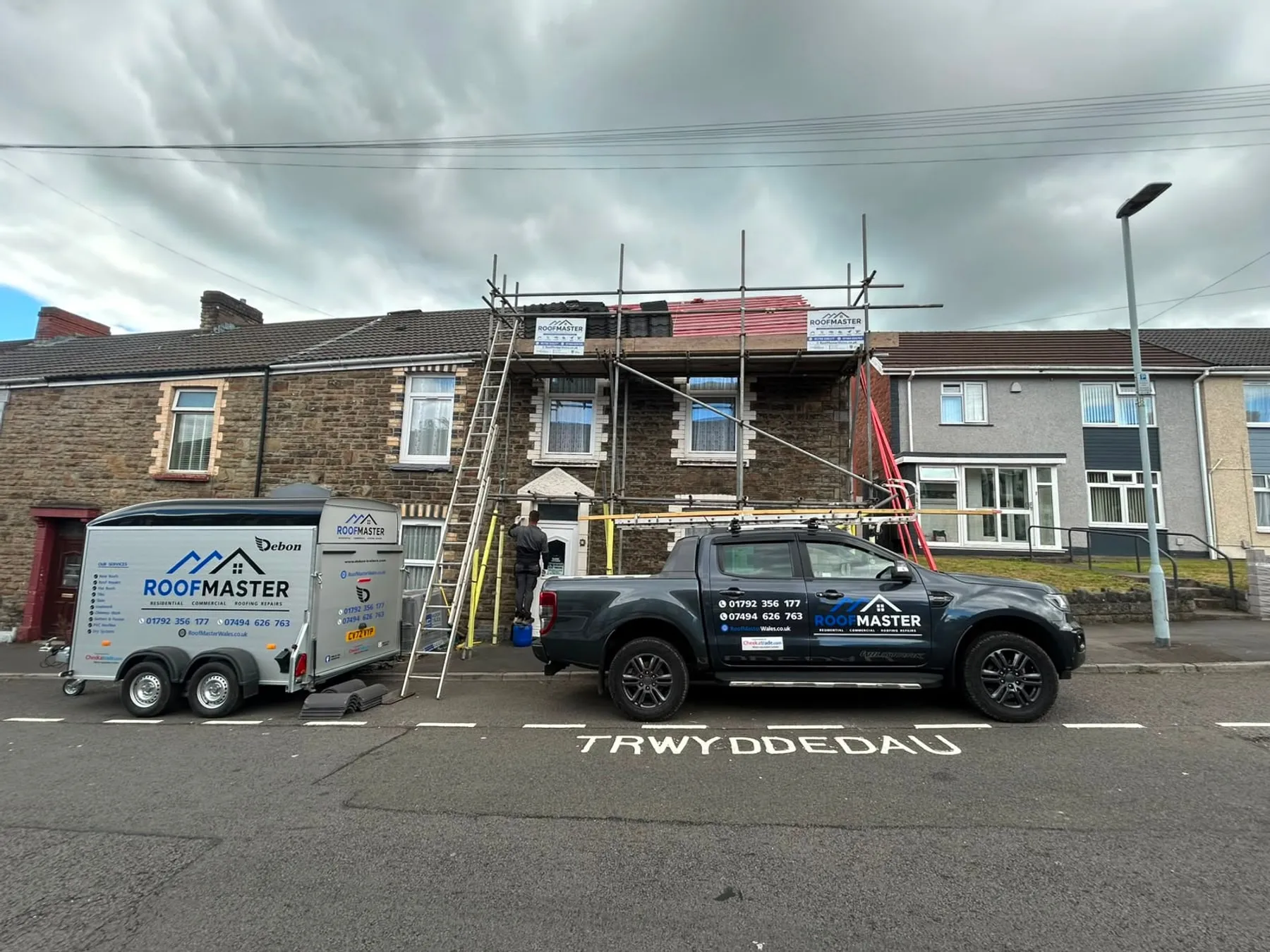 The Roofmaster van and team on a re-roofing job in the Swansea area
